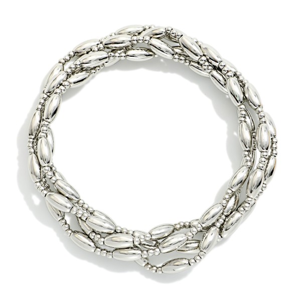 Set Of Four Metal Tone Cylinder Bead Beaded Stretch Bracelets 

- Approximately 2.5" D