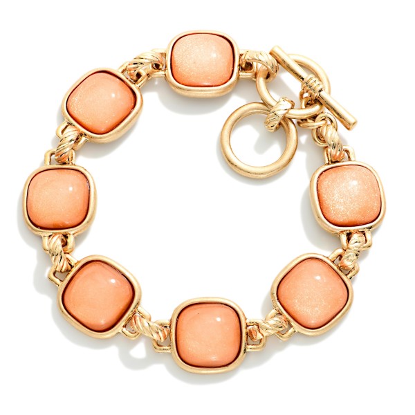 Metal Tone Bracelet Featuring Glitter Resin Squared Stations With Toggle Clasp  

- Approximately 3.5