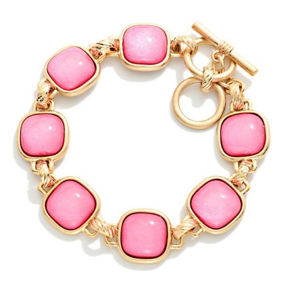 Metal Tone Bracelet Featuring Glitter Resin Squared Stations With Toggle Clasp  

- Approximately 3.5