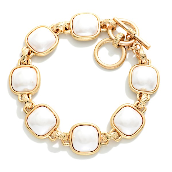 Metal Tone Bracelet Featuring Glitter Resin Squared Stations With Toggle Clasp  

- Approximately 3.5