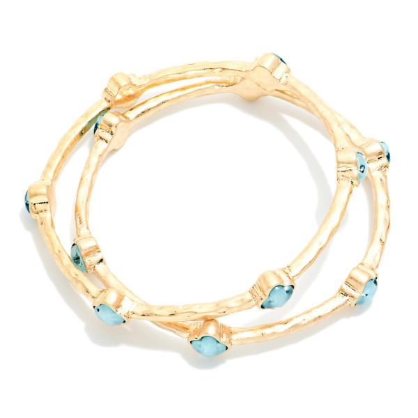 Set Of Two Hammered Metal Tone Bangle Bracelet Featuring Glitter Resin Clover 

- Approximately 2.75