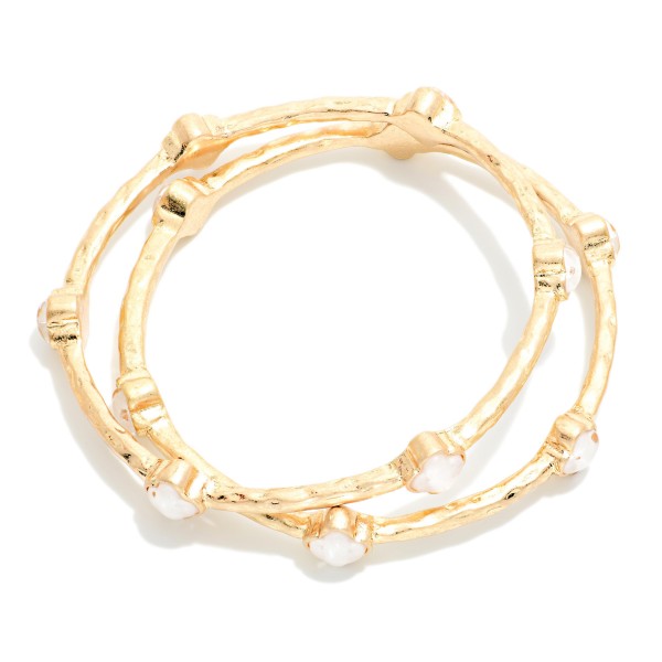 Set Of Two Hammered Metal Tone Bangle Bracelet Featuring Glitter Resin Clover 

- Approximately 2.75