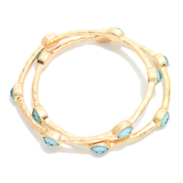 Set Of Two Hammered Metal Tone Bangle Bracelet Featuring Glitter Resin Oval Stations  

- Approximately 2.75