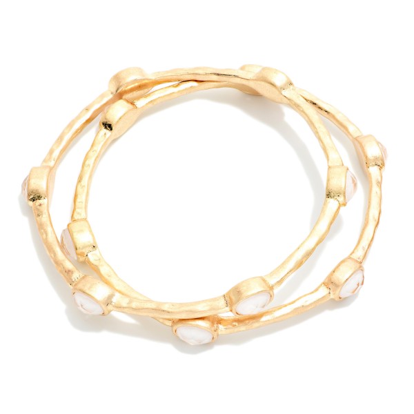 Set Of Two Hammered Metal Tone Bangle Bracelet Featuring Glitter Resin Oval Stations  

- Approximately 2.75