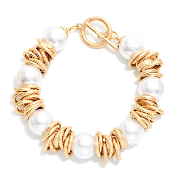 Beaded  Bracelet Featuring Pearls And Metal Tone Rings With Toggle Clasp

- Approximately 3" D