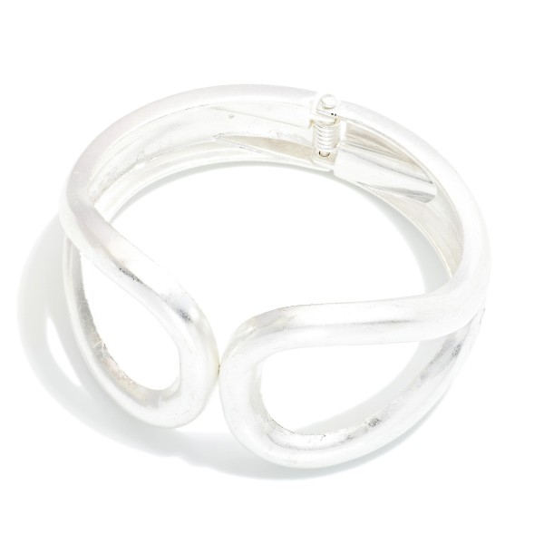 Hollow Metal Tone Hinged Bangle Bracelet 

- Approximately 2.5" D 