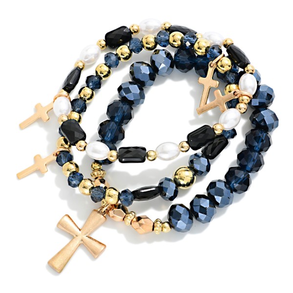 Set Of Three Beaded Stretch Bracelets Featuring Faceted Beads, Pearls, & Cross Charms 

- Approximately 2.5" D