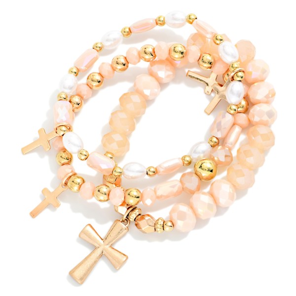 Set Of Three Beaded Stretch Bracelets Featuring Faceted Beads, Pearls, & Cross Charms 

- Approximately 2.5" D