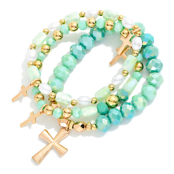 Set Of Three Beaded Stretch Bracelets Featuring Faceted Beads, Pearls, & Cross Charms 

- Approximately 2.5" D