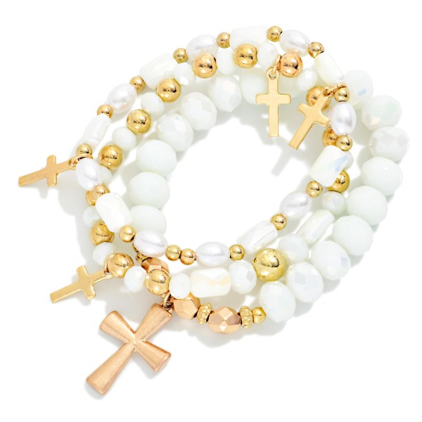 Set Of Three Beaded Stretch Bracelets Featuring Faceted Beads, Pearls, & Cross Charms 

- Approximately 2.5" D