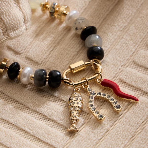 Beaded Bracelet Featuring Fish, Wishbone, & Pepper Charms 

- Approximately 2.5" D
