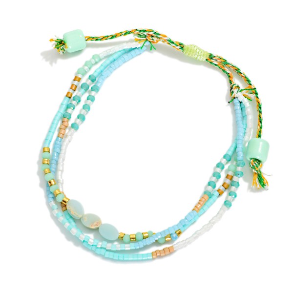 Adjustable Multi Colored Friendship Bracelet Featuring Different Beads 

- Adjustable One Size Fits Most 