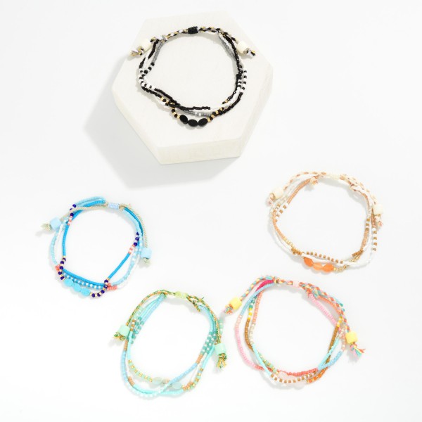 Adjustable Multi Colored Friendship Bracelet Featuring Different Beads 

- Adjustable One Size Fits Most 