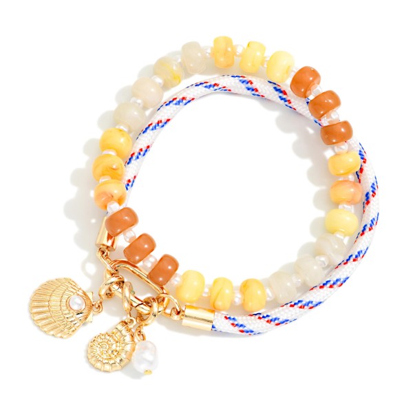 Set Of Two Marbled Acetate Bead Beaded Bracelet And Rope Bracelet With Shells And Pearl Charms

- Approximately 3" D 