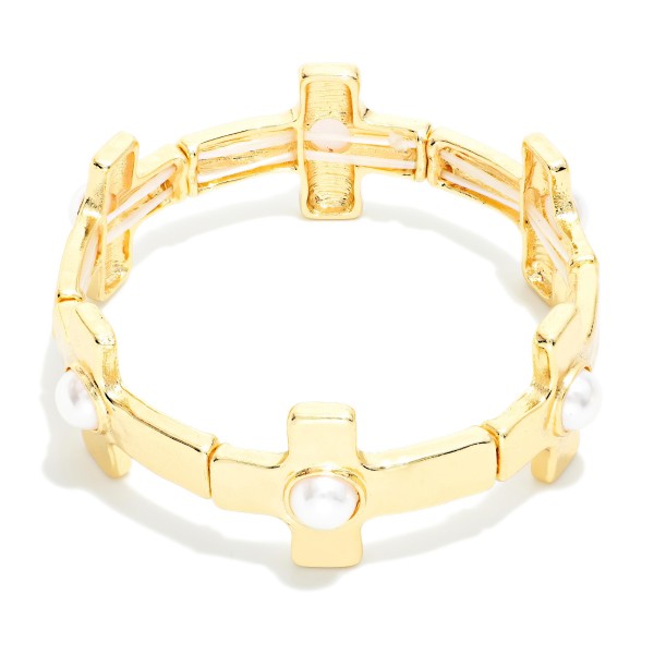 Metal Tone East West Cross Stretch Bracelet Featuring Pearls 

- Approximately 2.5" D 