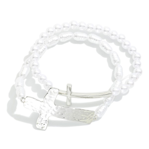 Set Of Two Pearl Beaded Stretch Bracelets Featuring Metal Tone East West Crosses 

- Approximately 2.5" D