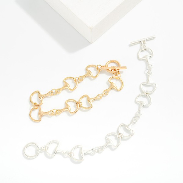  Metal Tone Horsebit Chain Link Bracelet

- Approximately 3" D

