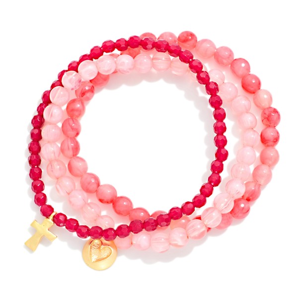 Set Of Three Beaded Stretch Bracelets Featuring Faceted & Stone Beads With Hammered Metal Heart & Cross Charms 

- Approximately 2.75" D