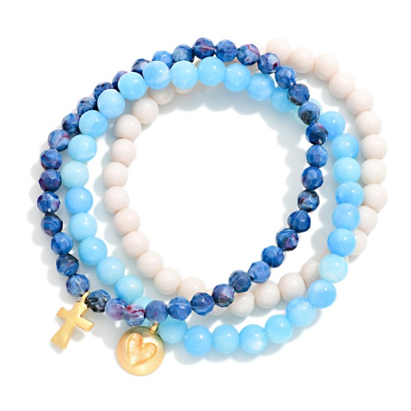 Set Of Three Beaded Stretch Bracelets Featuring Faceted & Stone Beads With Hammered Metal Heart & Cross Charms 

- Approximately 2.75" D