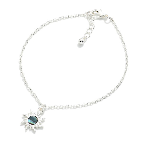 Chain Link Anklet Featuring Metal Pearlescent Sun Charm

- Approximately 2" D
- Extender 2" L  