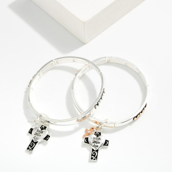Metal Tone Bangle Stretch Bracelet With Hearts Featuring Cross & Heart Charm

- Approximately 2.5" D