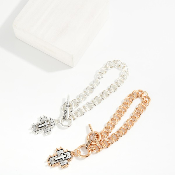 Double Circle Link Chain Link Bracelet Featuring Metal Tone Cross Charm 

- Approximately 3" D