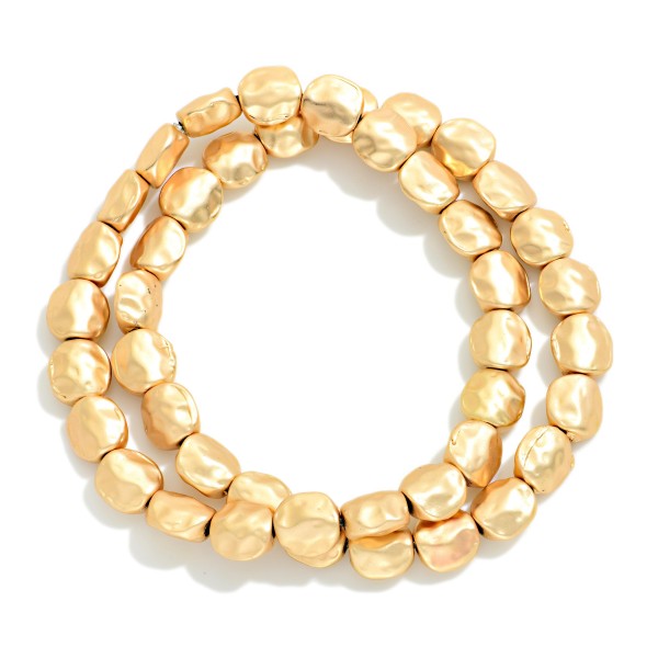 Set Of Two Hammered Metal Nugget Bead Beaded Stretch Bracelets

- Approximately 2.25" D