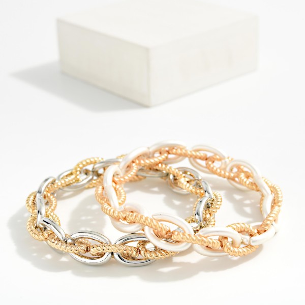 Metal Tone Chain Link Stretch Bracelet Featuring Twisted Links 

- Approximately 2.5" D