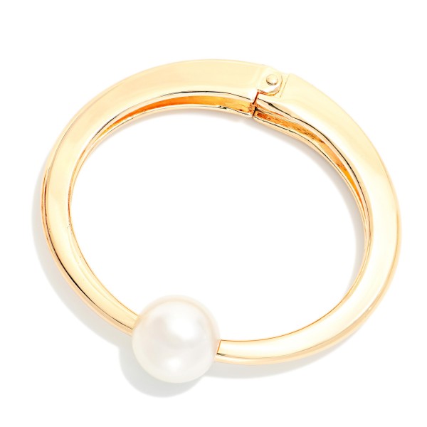 Metal Tone Hinged Bangle Bracelet Featuring Pearl 

- Approximately 2.5" D  