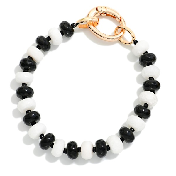 Game Day Faceted Bead Stretch Bracelet With Metal Tone Oval Clasp 

- Approximately 2.5" D