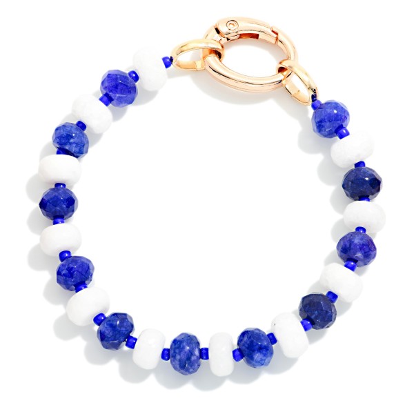 Game Day Faceted Bead Stretch Bracelet With Metal Tone Oval Clasp 

- Approximately 2.5" D