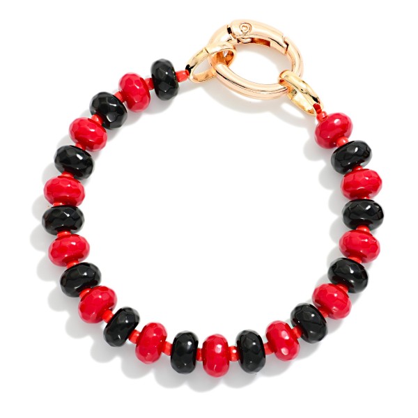 Game Day Faceted Bead Stretch Bracelet With Metal Tone Oval Clasp 

- Approximately 2.5" D
