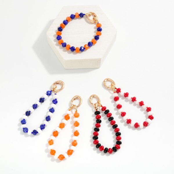 Game Day Faceted Bead Stretch Bracelet With Metal Tone Oval Clasp 

- Approximately 2.5" D