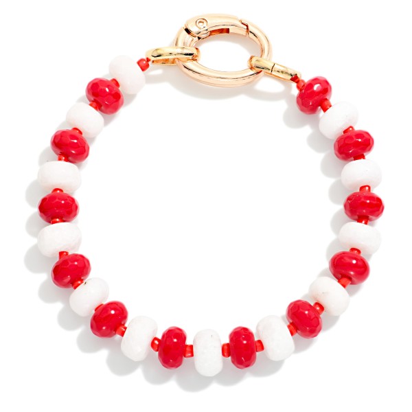 Game Day Faceted Bead Stretch Bracelet With Metal Tone Oval Clasp 

- Approximately 2.5" D