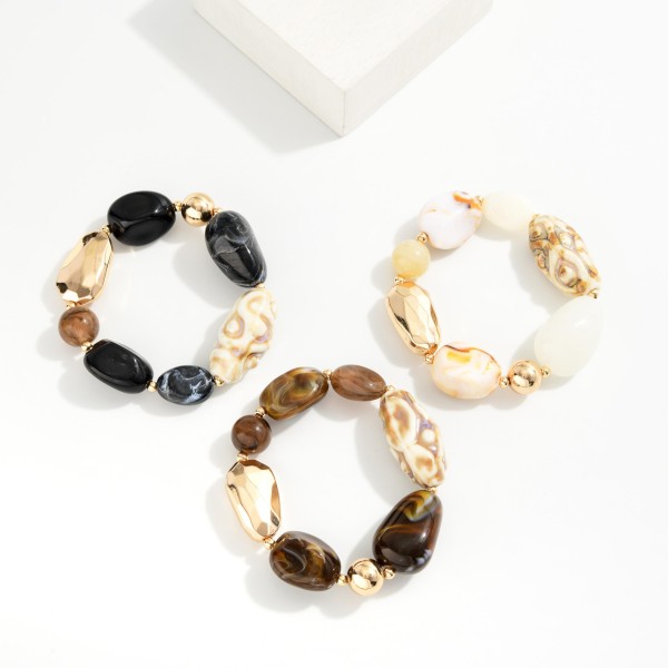 Chunky Beaded Bracelet Featuring Faceted Metal Tones & Marbled Acetate Beads 

- Approximately 2.5" D
