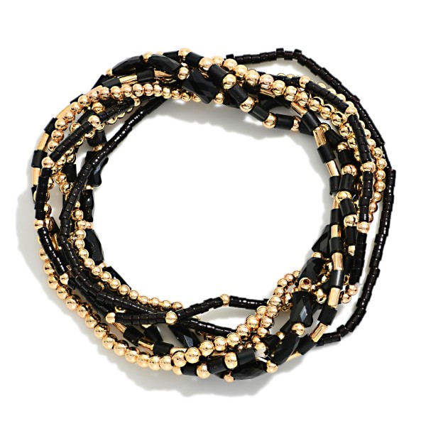 Set Of 7 Petite Bead Beaded Stretch Bracelets Featuring Metal Tones, Heishi Beads, & Cylinder Beads 

- Approximately 2.5" D