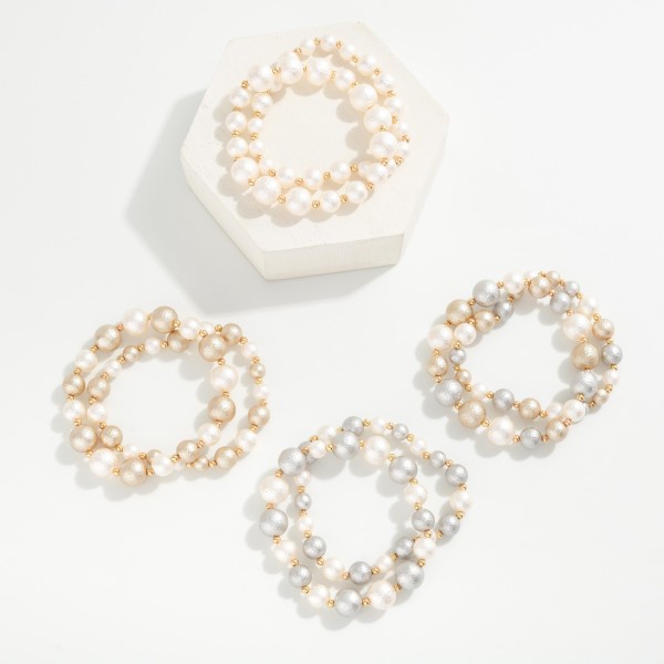 Set Of Two Textured Metallic Beaded Stretch Bracelets 

- Approximately 2.5" D