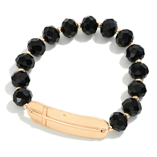 Faceted Bead Beaded Stretch Bracelet Featuring Metal Tone East West Cross

- Approximately 2.5" D