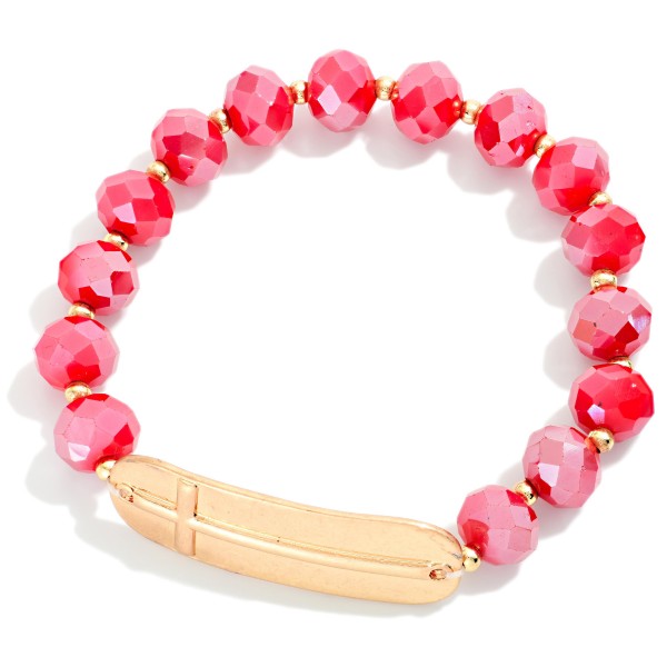 Faceted Bead Beaded Stretch Bracelet Featuring Metal Tone East West Cross

- Approximately 2.5" D