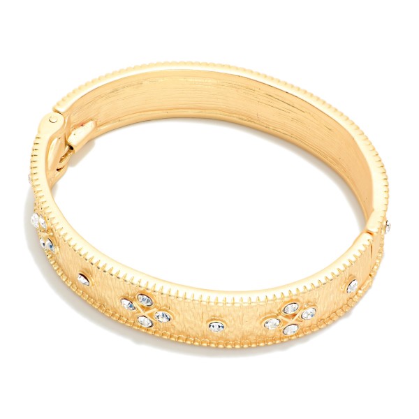 Textured Metal Hinged Bangle Bracelet Featuring Rhinestone Flower Details 

- Approximately 2.75" D