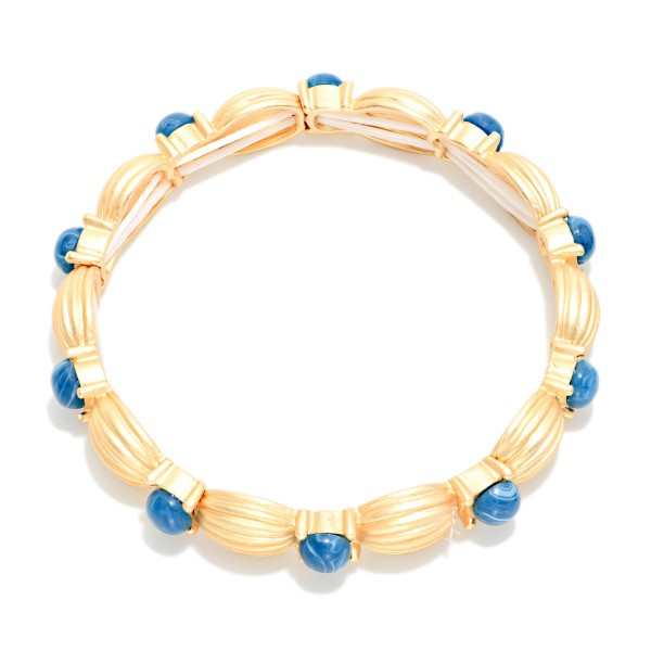 Ribbed Bangle Bracelet Featuring Acetate Dome Details 

- Approximately 2.5" D