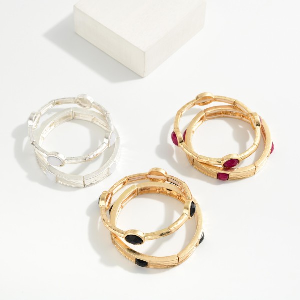 Set Of Two Hammered Metal Bangle Bracelets Featuring Faceted Acetate Details 

- Approximately 2.5" D