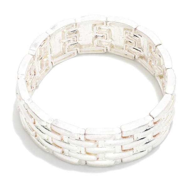 Metal Tone Watch Link Stretch Bangle Bracelet 

- Approximately 3.5" D 