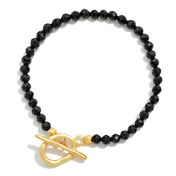 Faceted Stone Beaded Stretch Bracelet With Metal Tone Toggle Clasp 

- Approximately 2.25" D
