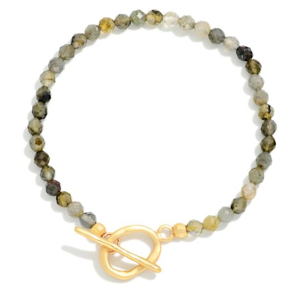 Faceted Stone Beaded Stretch Bracelet With Metal Tone Toggle Clasp 

- Approximately 2.25" D