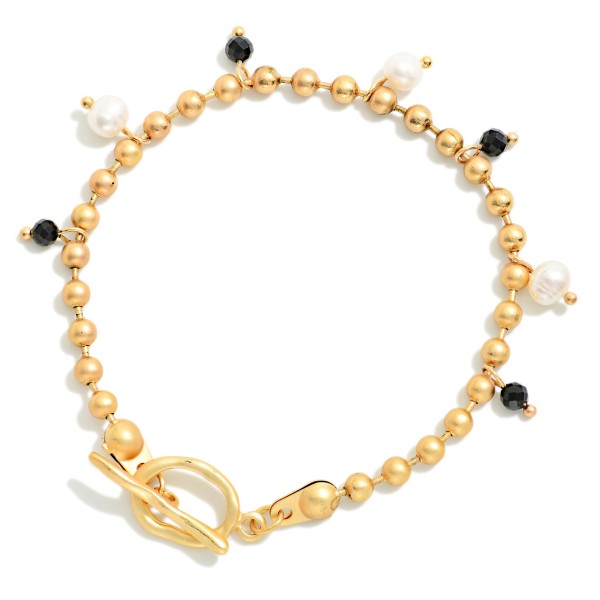 Metal Tone Ball Chain Bracelet Featuring Stone & Pearl Charms With Toggle Clasp 

- Approximately 3" D