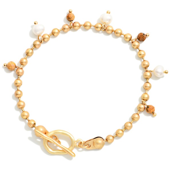 Metal Tone Ball Chain Bracelet Featuring Stone & Pearl Charms With Toggle Clasp 

- Approximately 3" D