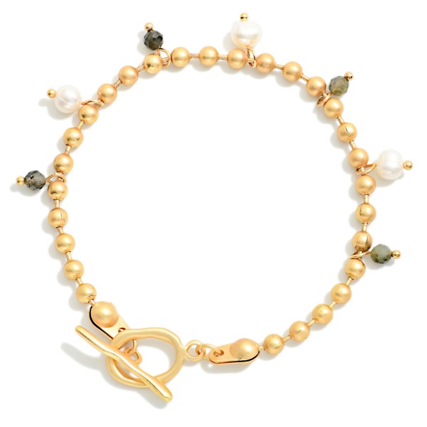 Metal Tone Ball Chain Bracelet Featuring Stone & Pearl Charms With Toggle Clasp 

- Approximately 3" D