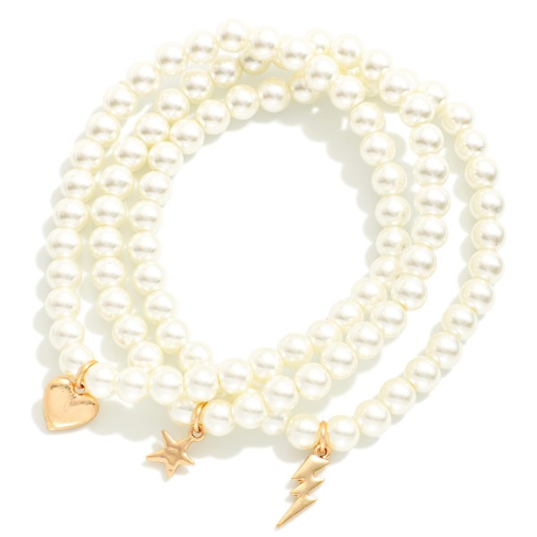 Set OF Three Beaded Stretch Bracelets Featuring Metal Tone Heart, Star, & Lightning Bolt Charms 

- Approximately 3" D