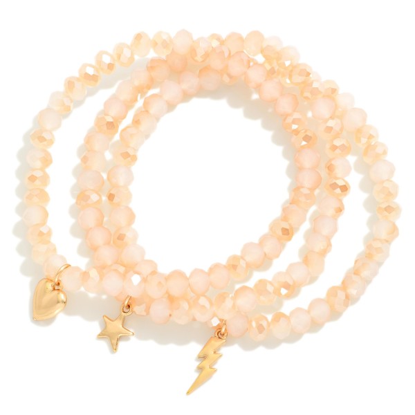 Set OF Three Beaded Stretch Bracelets Featuring Metal Tone Heart, Star, & Lightning Bolt Charms 

- Approximately 3" D